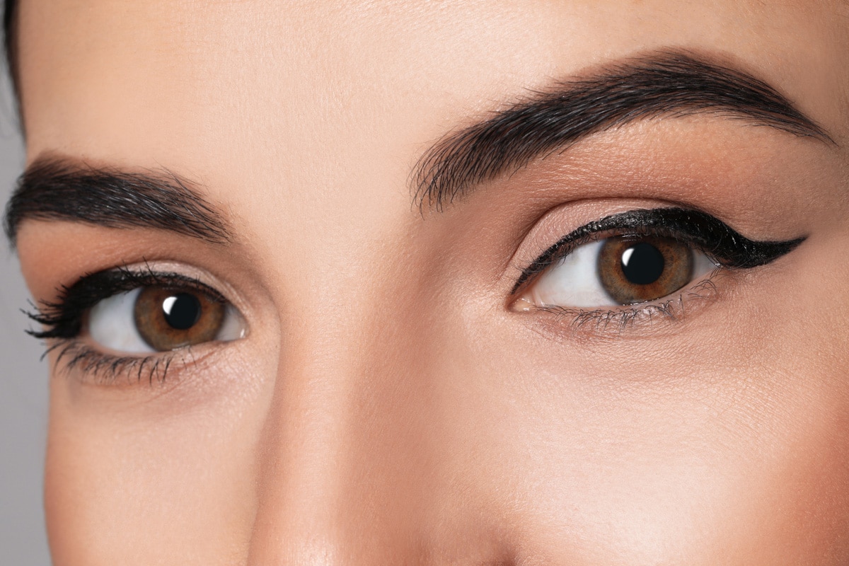 Closeup of a woman with cat eye eyeliner