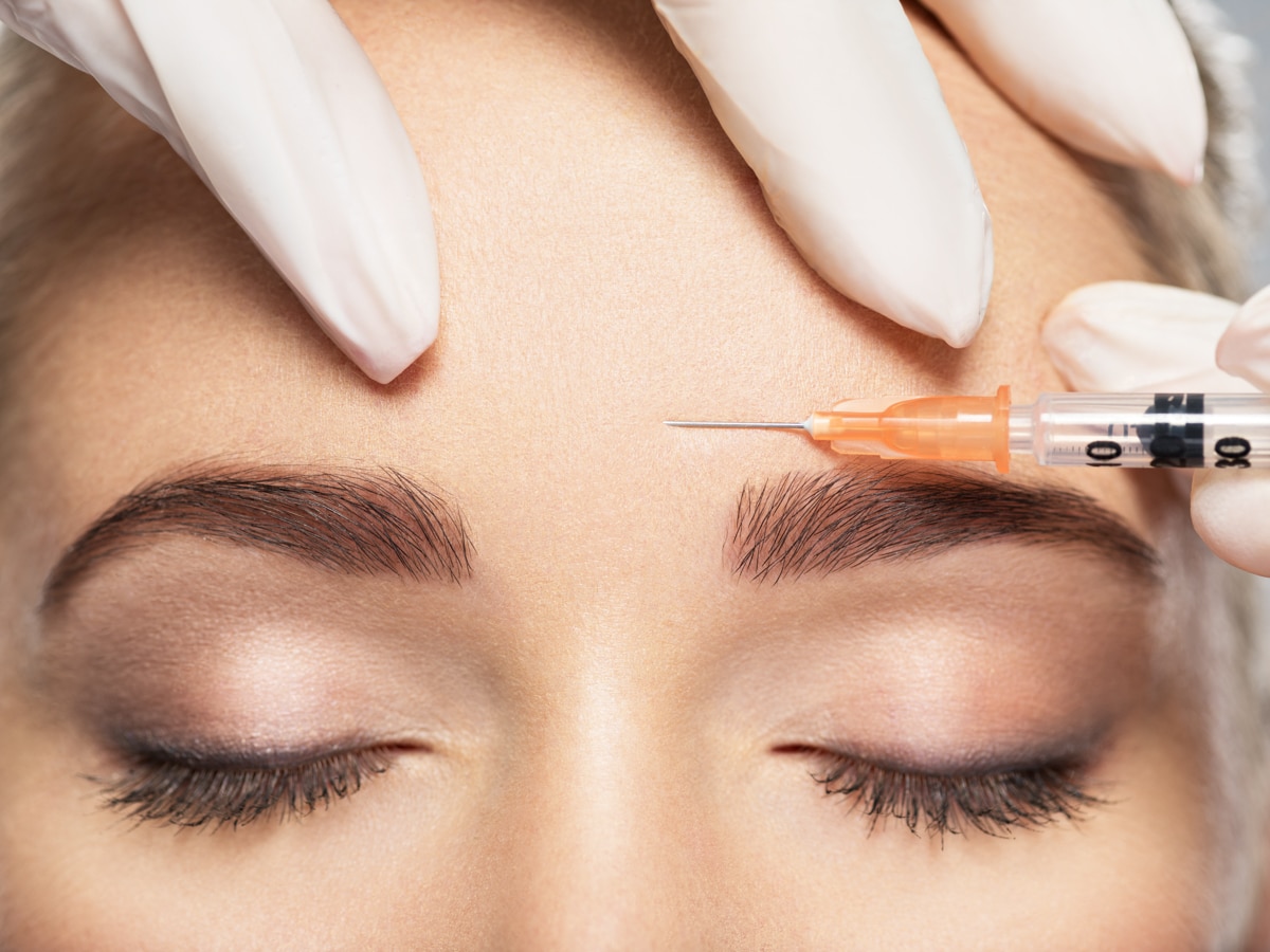 Botox is injected into the forehead of a patient